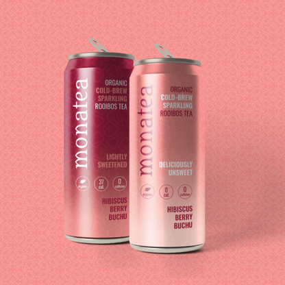 Two cans of Monatea organic cold-brew sparkling rooibos tea on a pink background